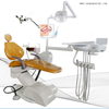 Стоматологическое кресло желтого цвета с микроскопом и оральной камерой с монитором 17 дюймов.