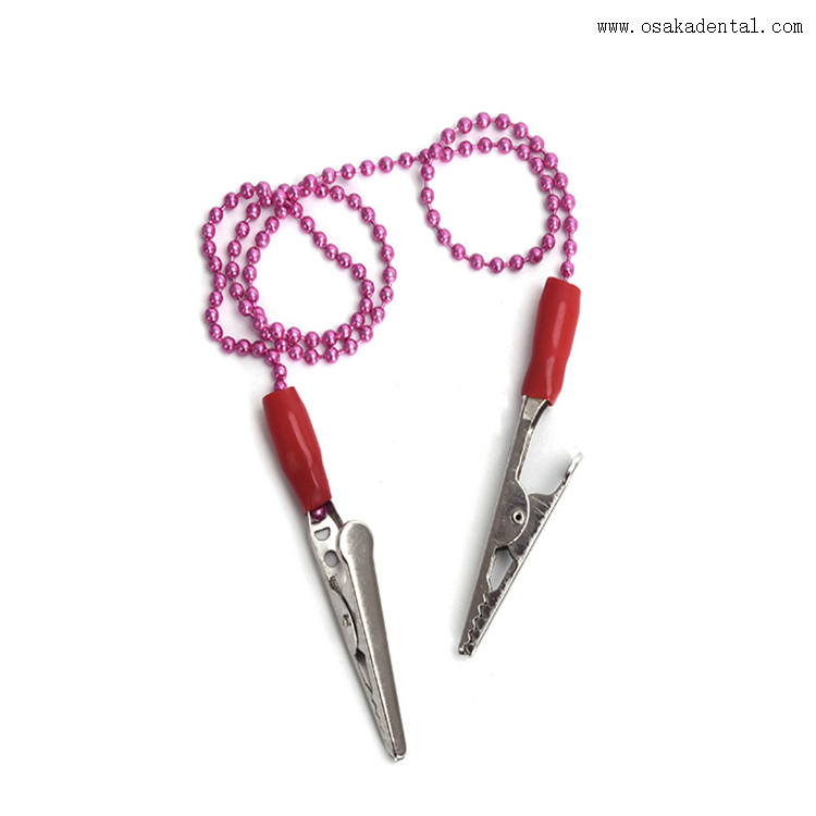 Держатель стоматологических нагрудников с пластиковым или металлическим зажимом