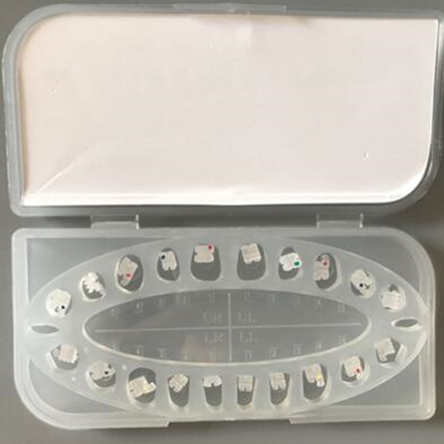 Стоматологический керамический ортодонтический кронштейн эластичный