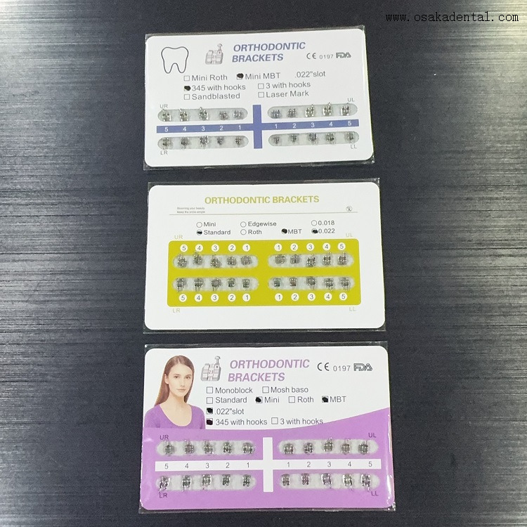 Стоматологический ортодонтический моноблочный металлический кронштейн