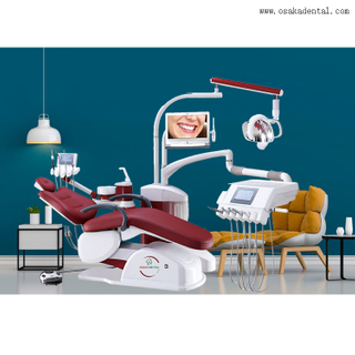 Стоматологическое кресло красного цвета с лотком для инструментов с сенсорным экраном