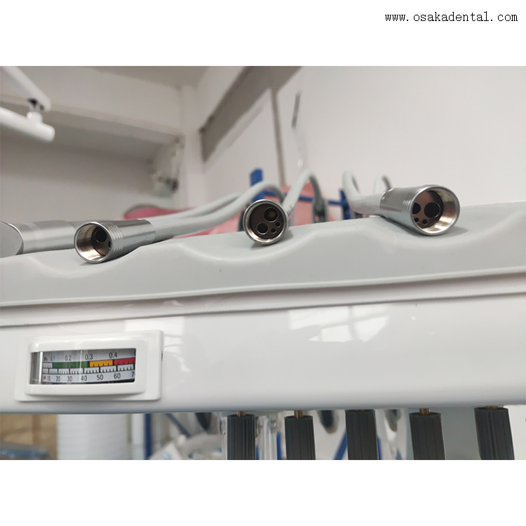 Стоматологическое кресло с ножной педалью и операционным блоком